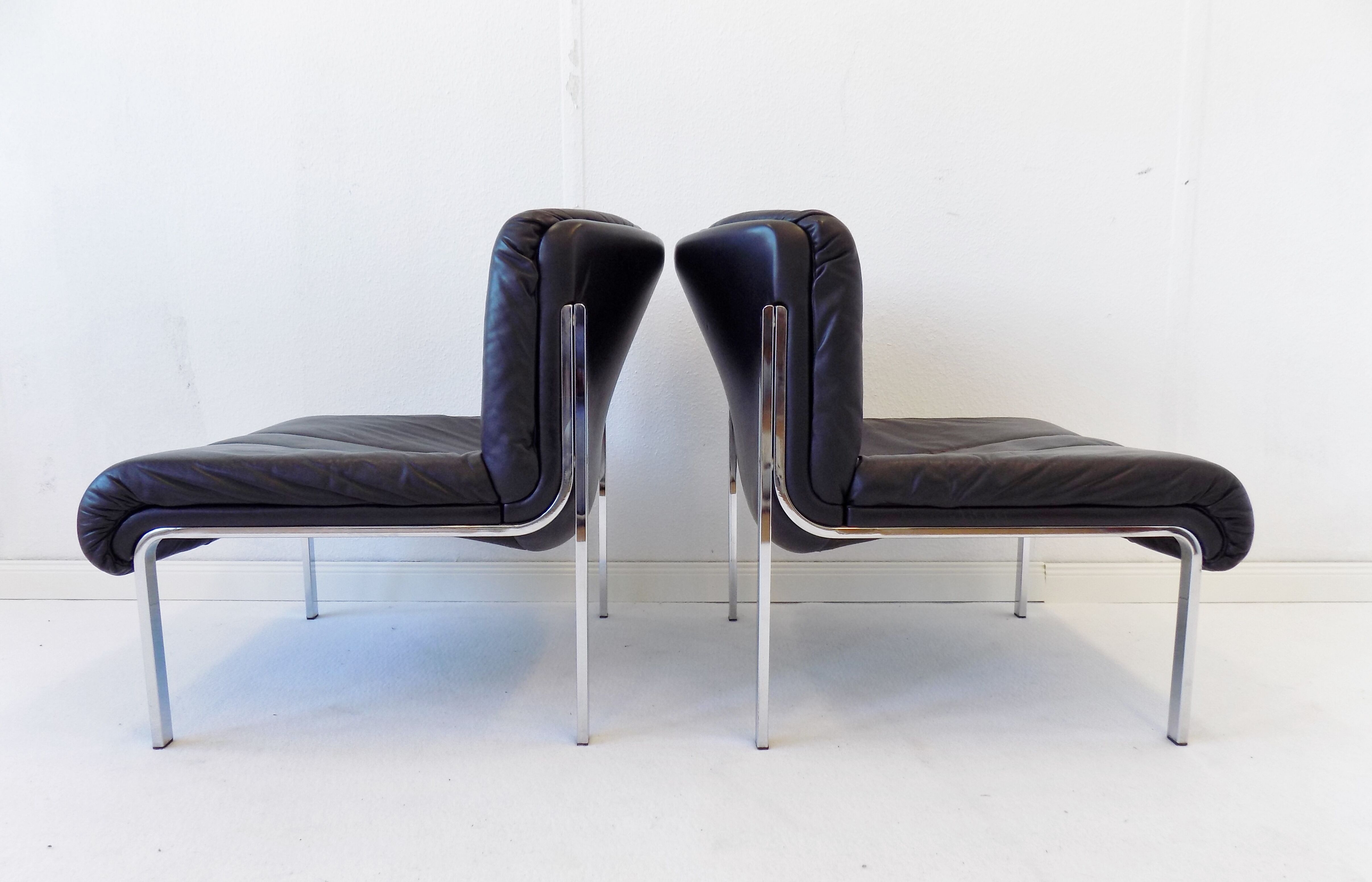 Girsberger Eurochair set of 2 black leather lounge chairs