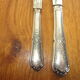 23 silver metal knives