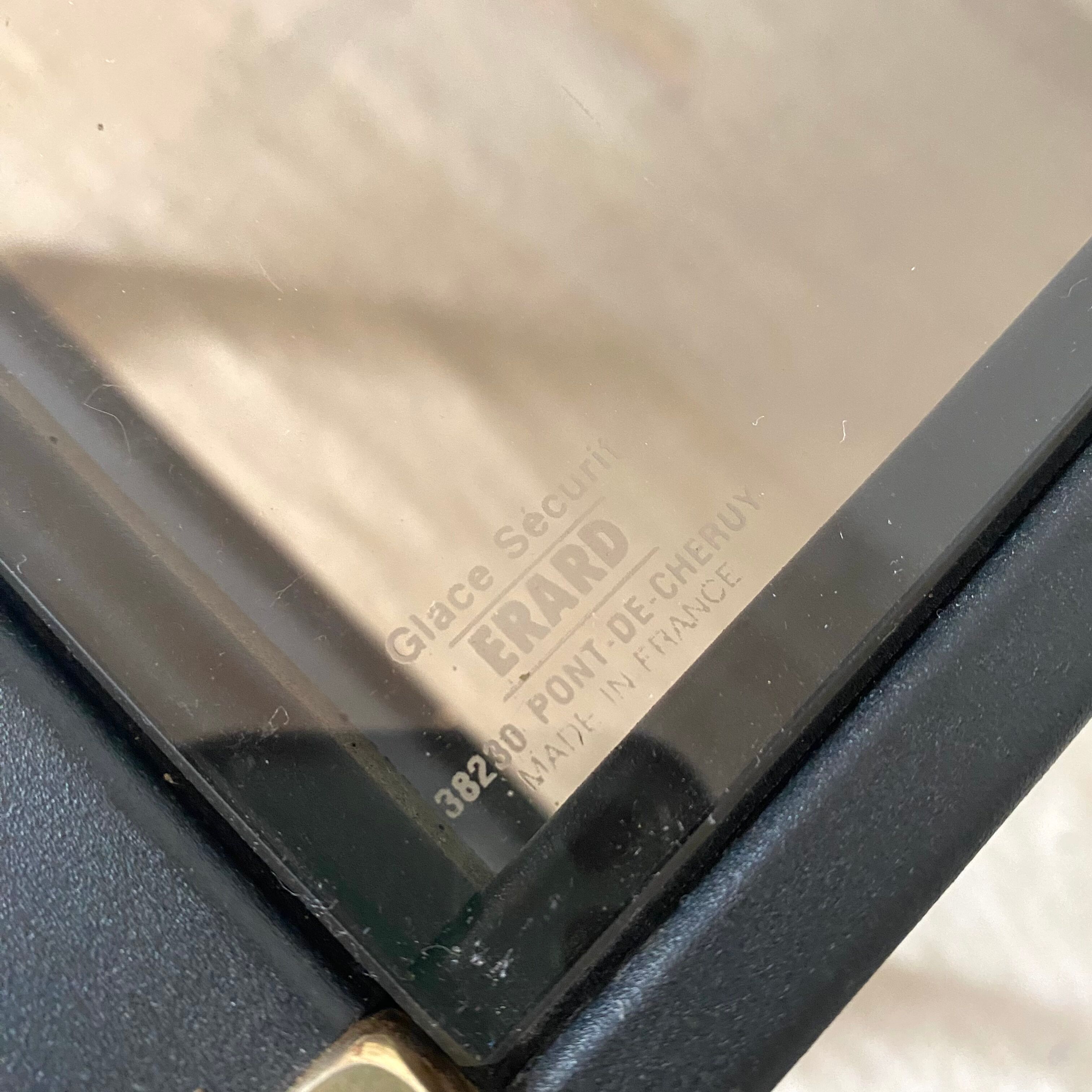 Serving with vintage wheels in metal and smoked glass