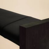 Maërl SEPIA bench, ebonized chestnut and black leather.