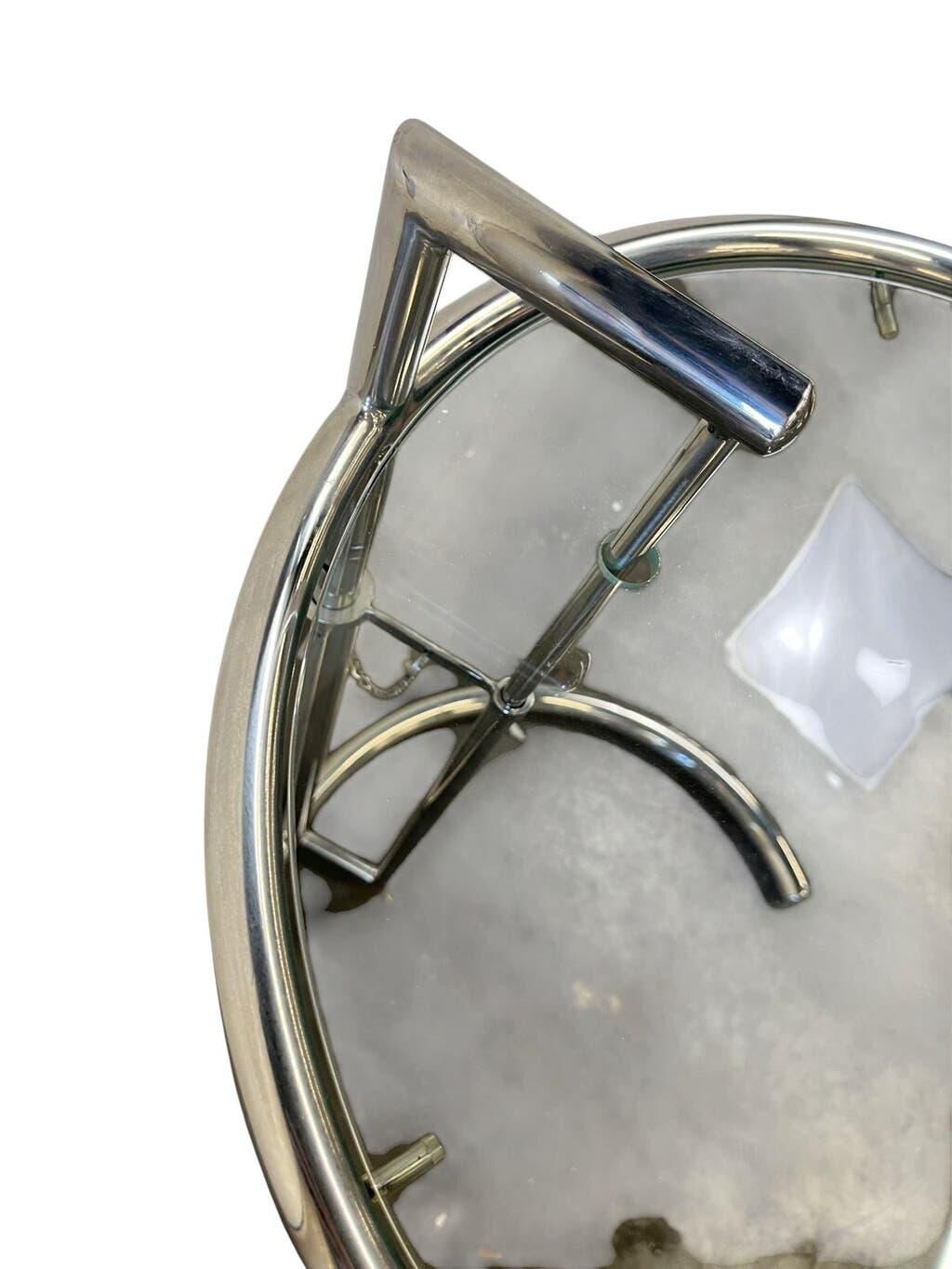 Vintage adjustable chrome side table with smoked glass.