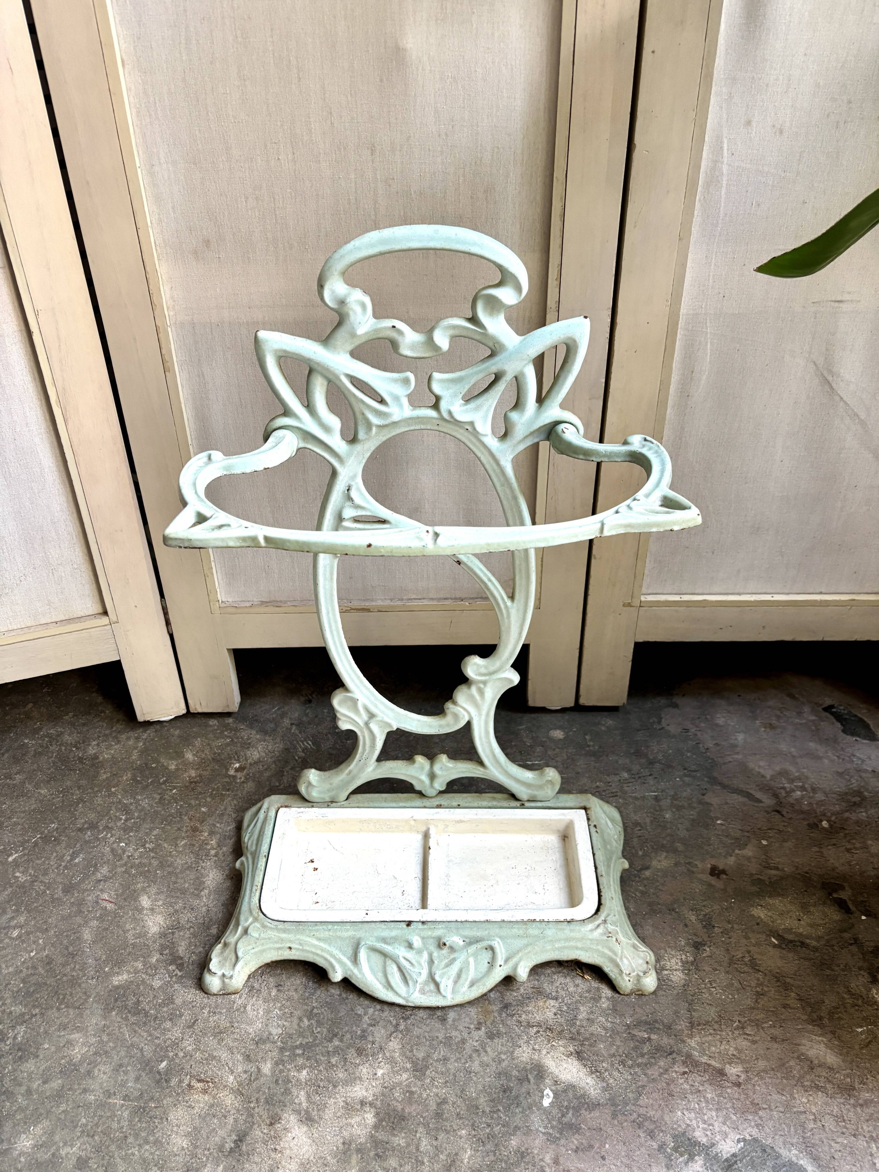 Art Nouveau umbrella stand in water green cast iron