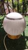 Plafonnier boule en verre rose granité