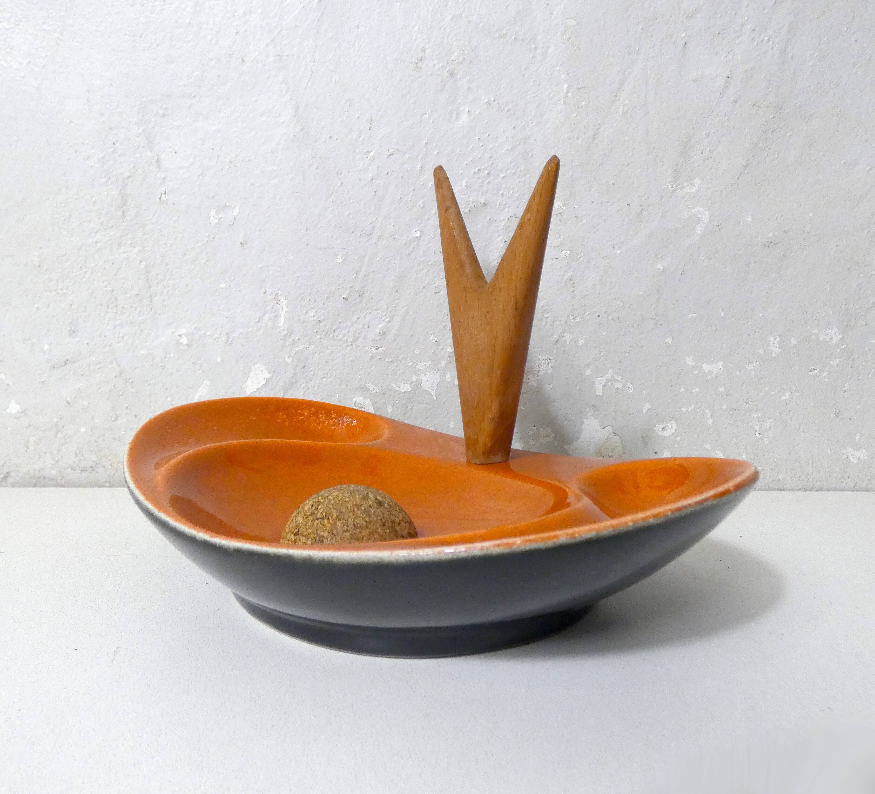 old ceramic and asymmetrical wood pipe ashtray