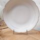 White and gold porcelain bowl