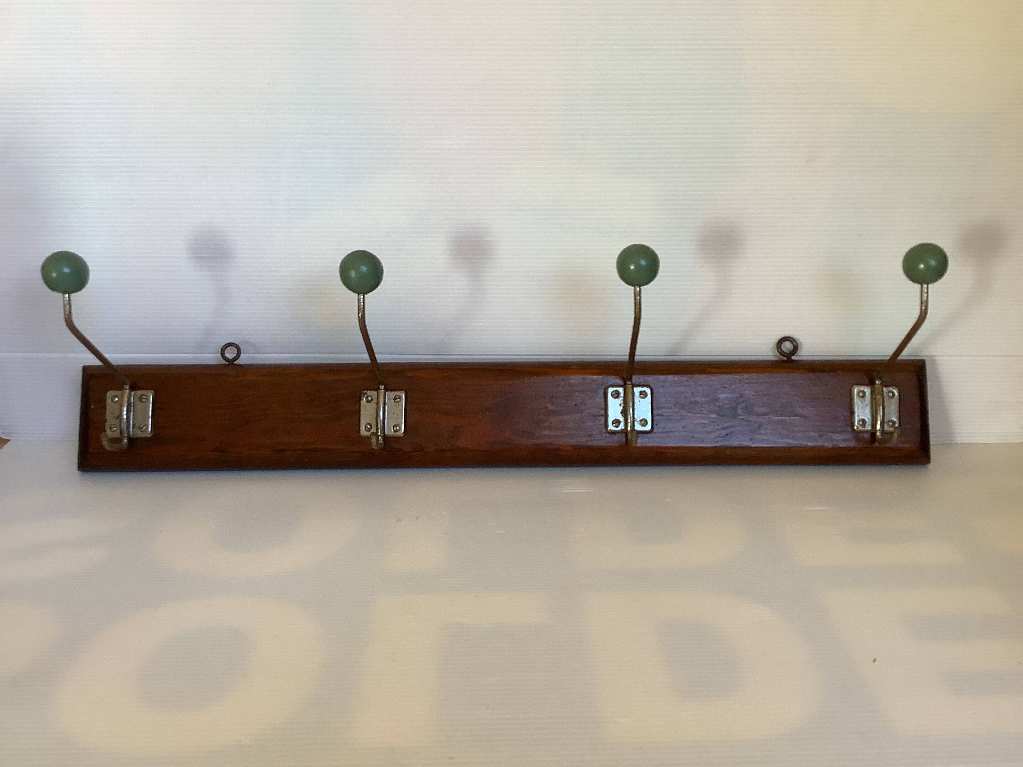 Old coat rack green balls wood metal
