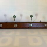 Old coat rack green balls wood metal