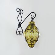 Italian vintage wall lamp in yellow blown glass and wrought iron. Year 70 80