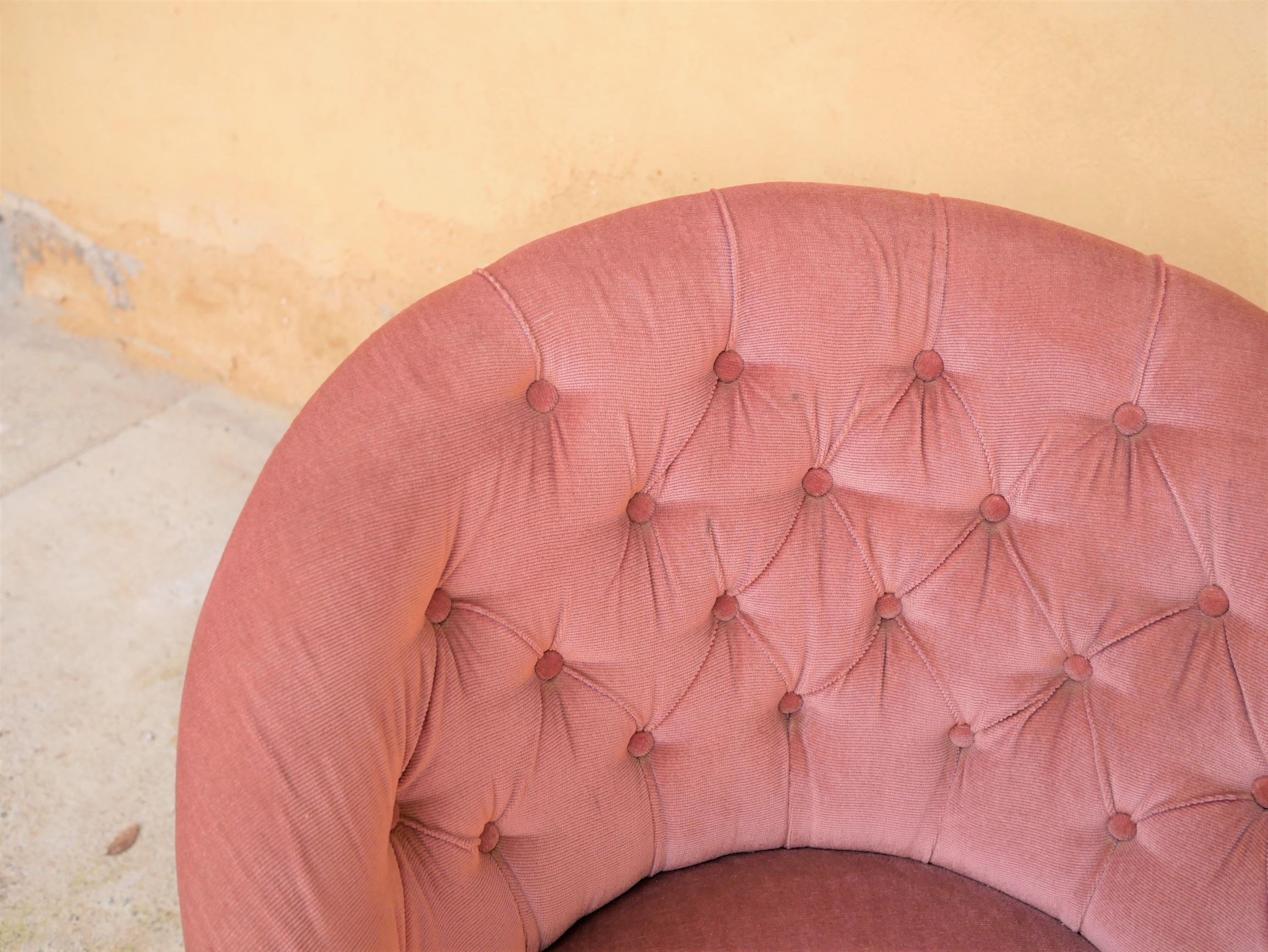 Old pink vintage padded "toad" chair