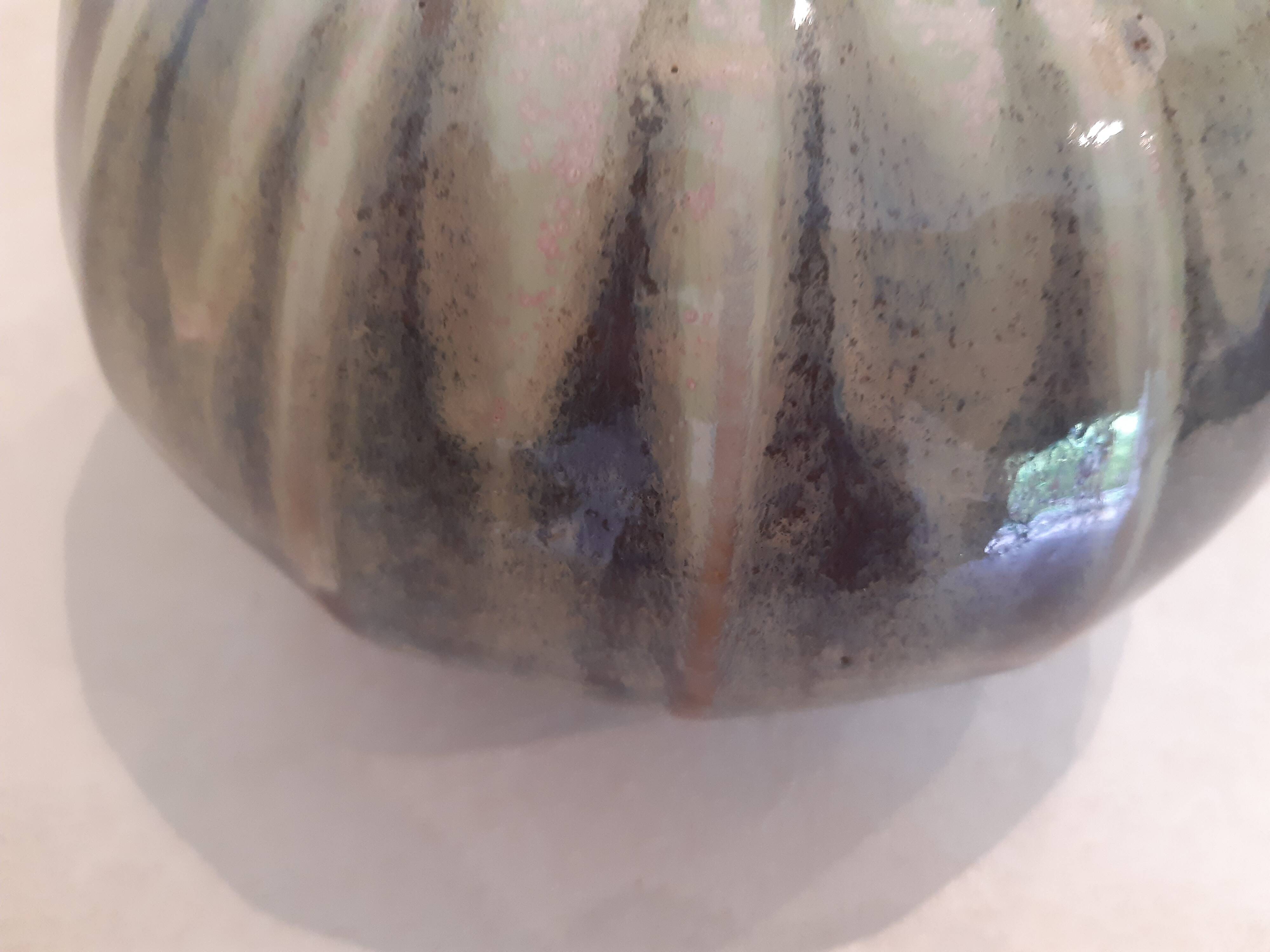 Globe vase, narrow neck, wide body.