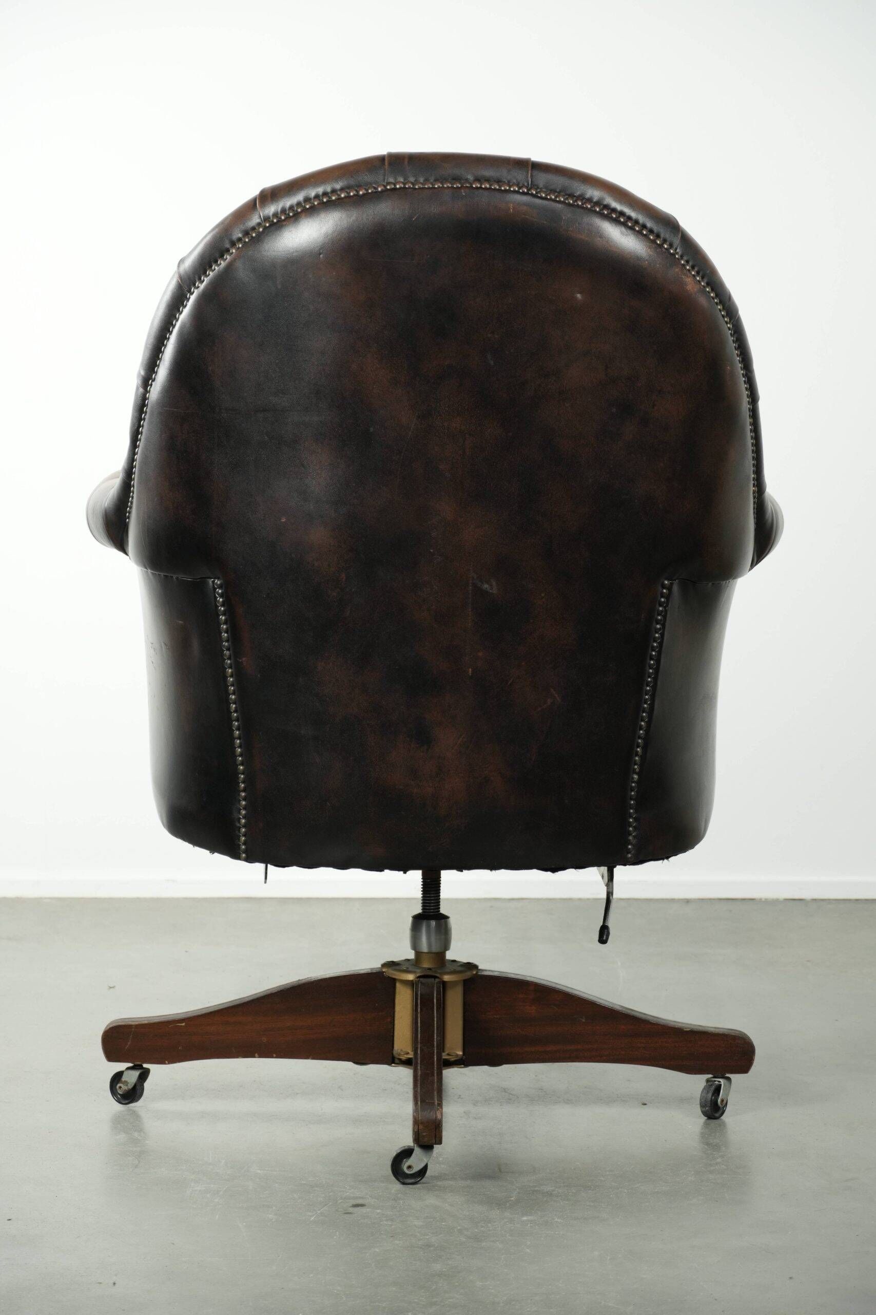 Vintage Chesterfield office chair with decorative nails in English style