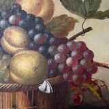 Still life painting of grapes and apples.