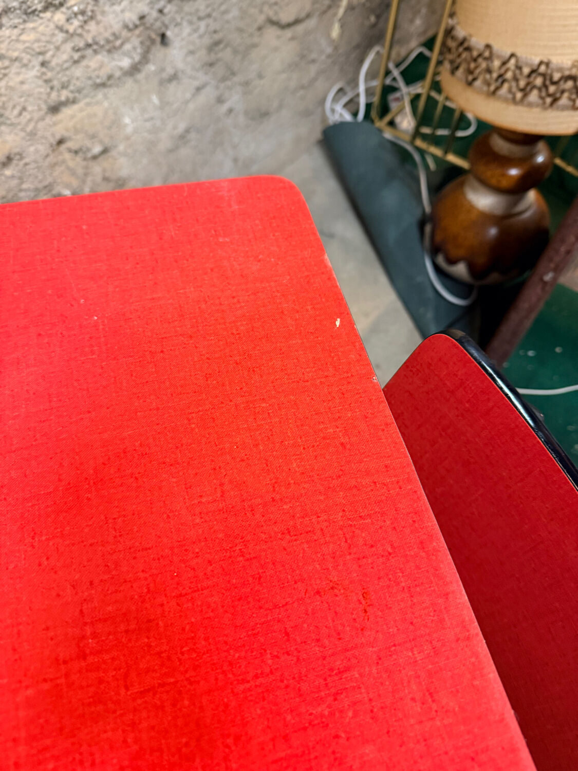 4 red Formica chairs with a 1970s table