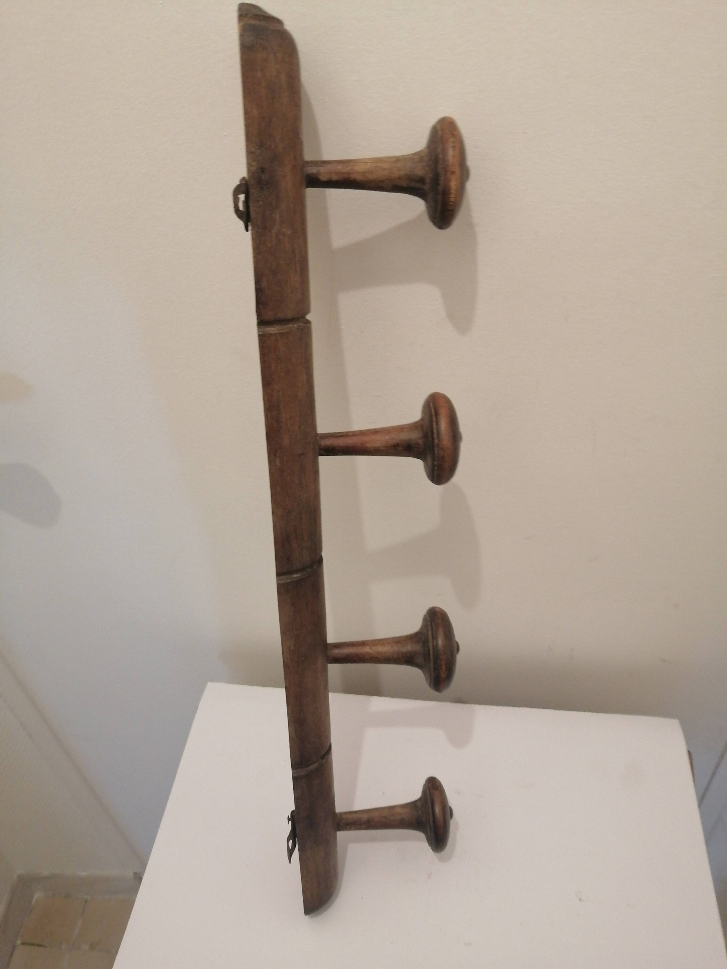 Vintage wooden coat rack with 4 hooks