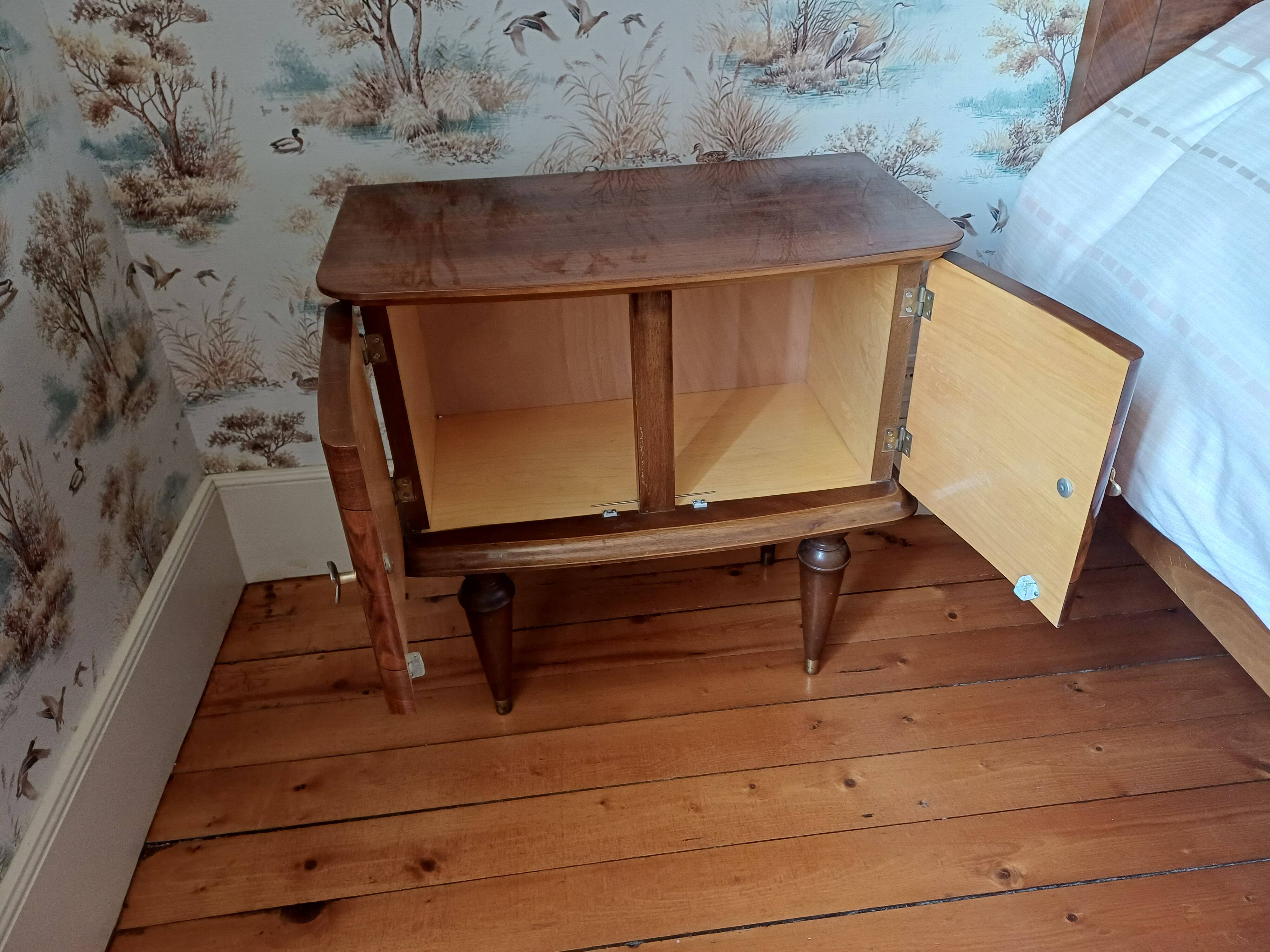 varnished wooden bedside table from the 1970s