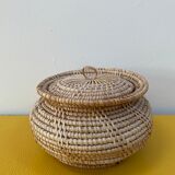 Vintage basket in braided rattan