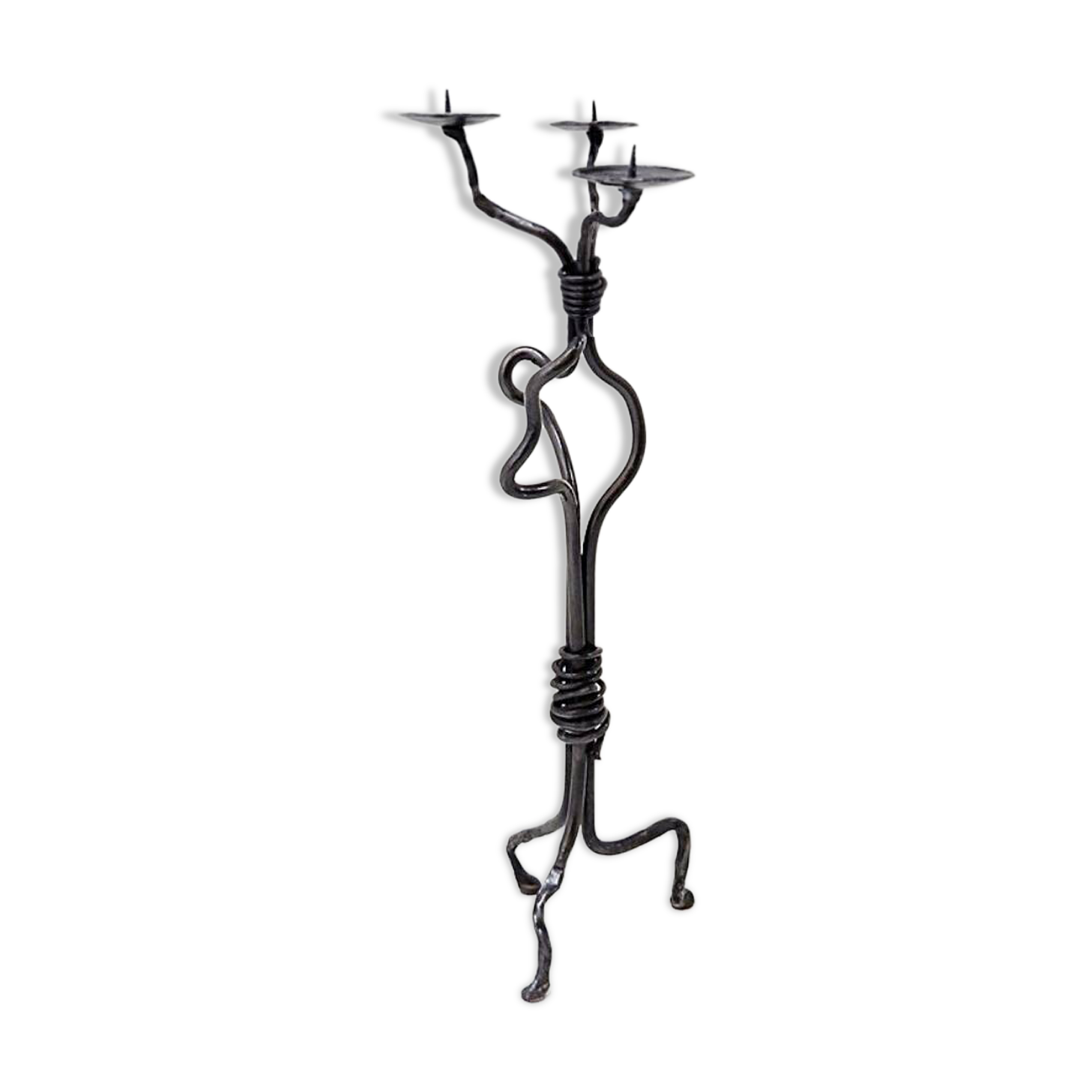 Large wrought iron candelabrum with an abstract design and three candle holders.