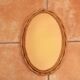 Oval mirror in rattan from the 60s, 40x26 cm