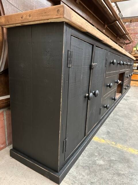 Old piece of furniture transformed into a TV stand