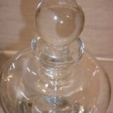 Wine decanter with cork on crystal base