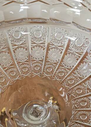 Cut crystal bowl on a brass base in bohemian style.