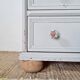 Commode ancienne à 4 tiroirs en bois peint gris perle patiné et pieds boules