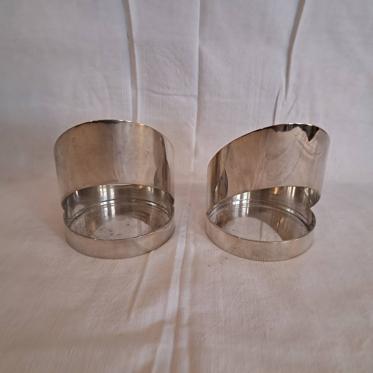 Pair of Paolo Gatti designer bottle holders
