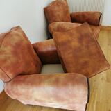 Pair of restored club armchairs, 50s