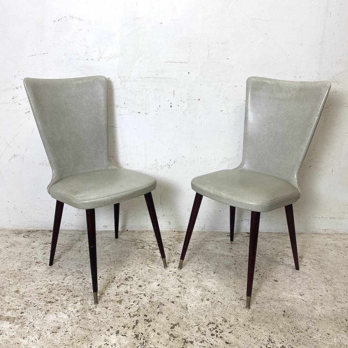 Pair of vintage 1960s gray faux leather chairs