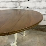 Round walnut drop leaf table