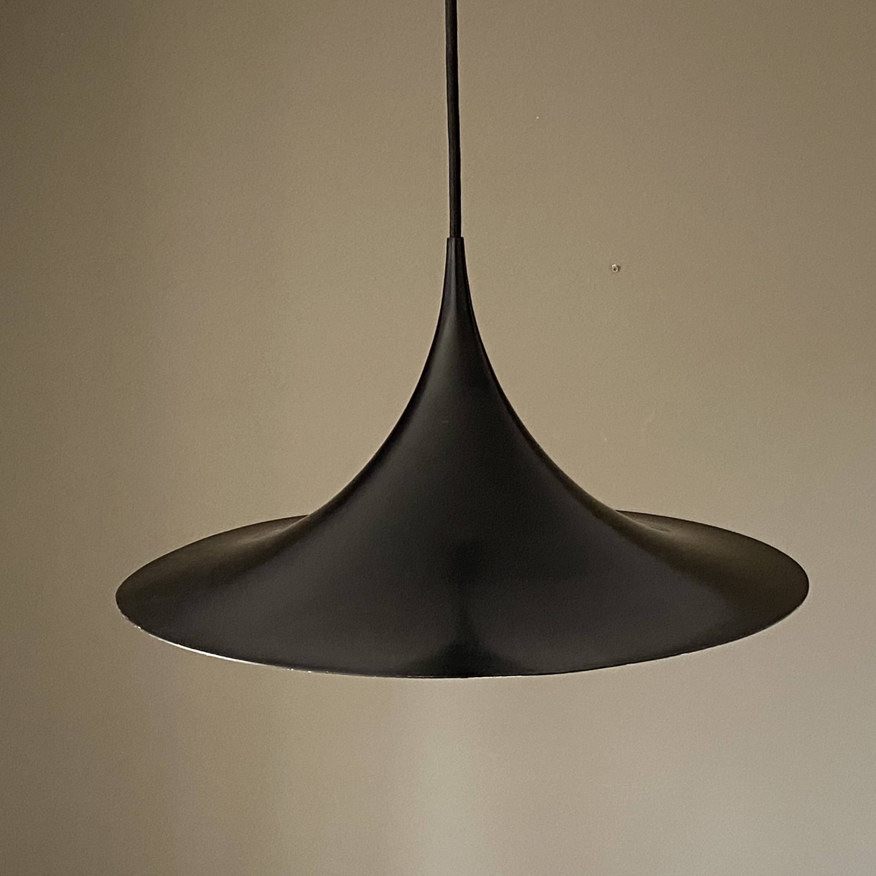 Semi pendant light by Claus Bonderup & Torsten Thorup. 1970.