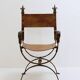 Fauteuil curule en fer forgé et cuir