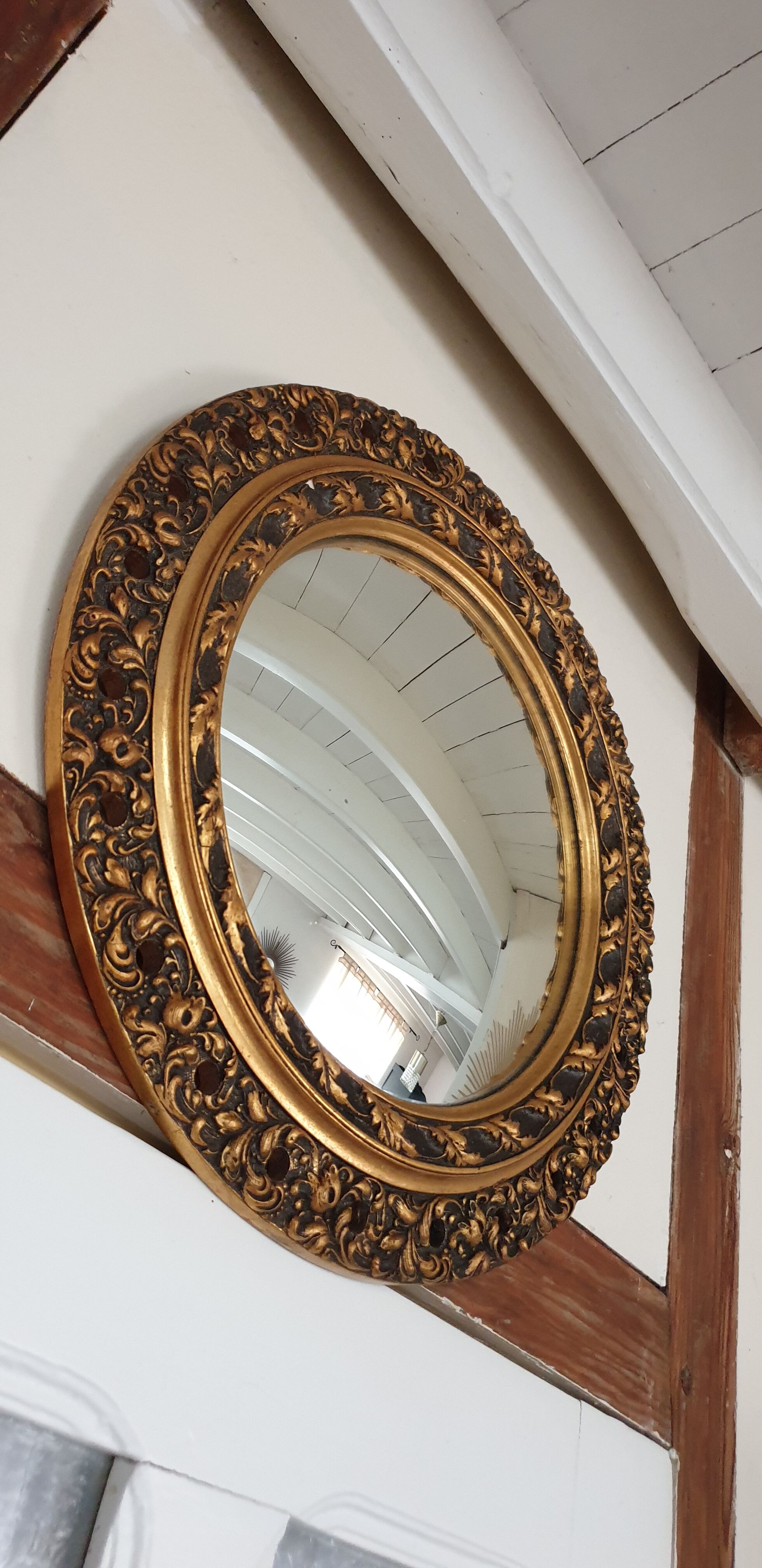 Carved golden witch mirror