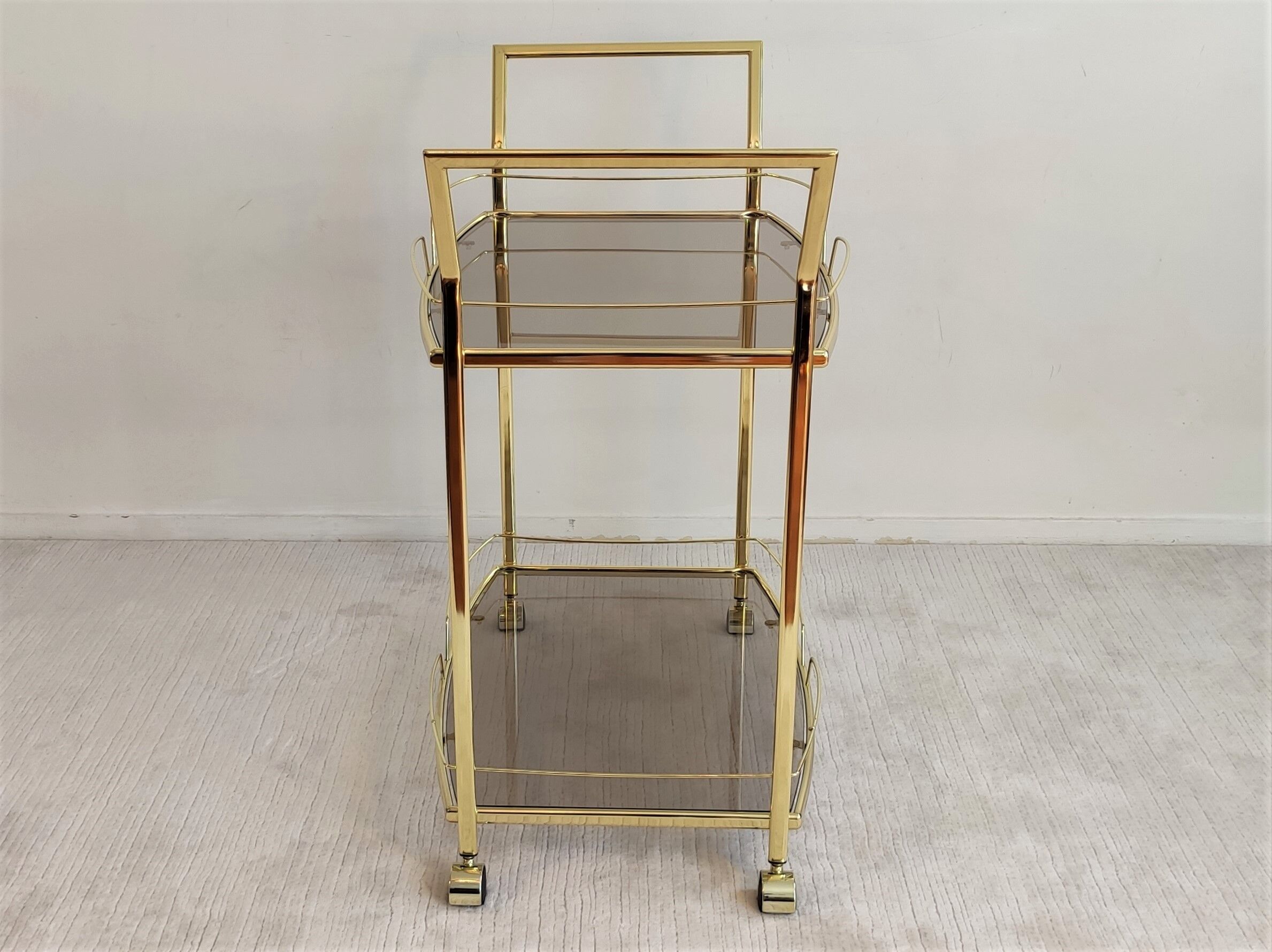 Serves golden trolley bar with wheels, in golden brass of the 80'S