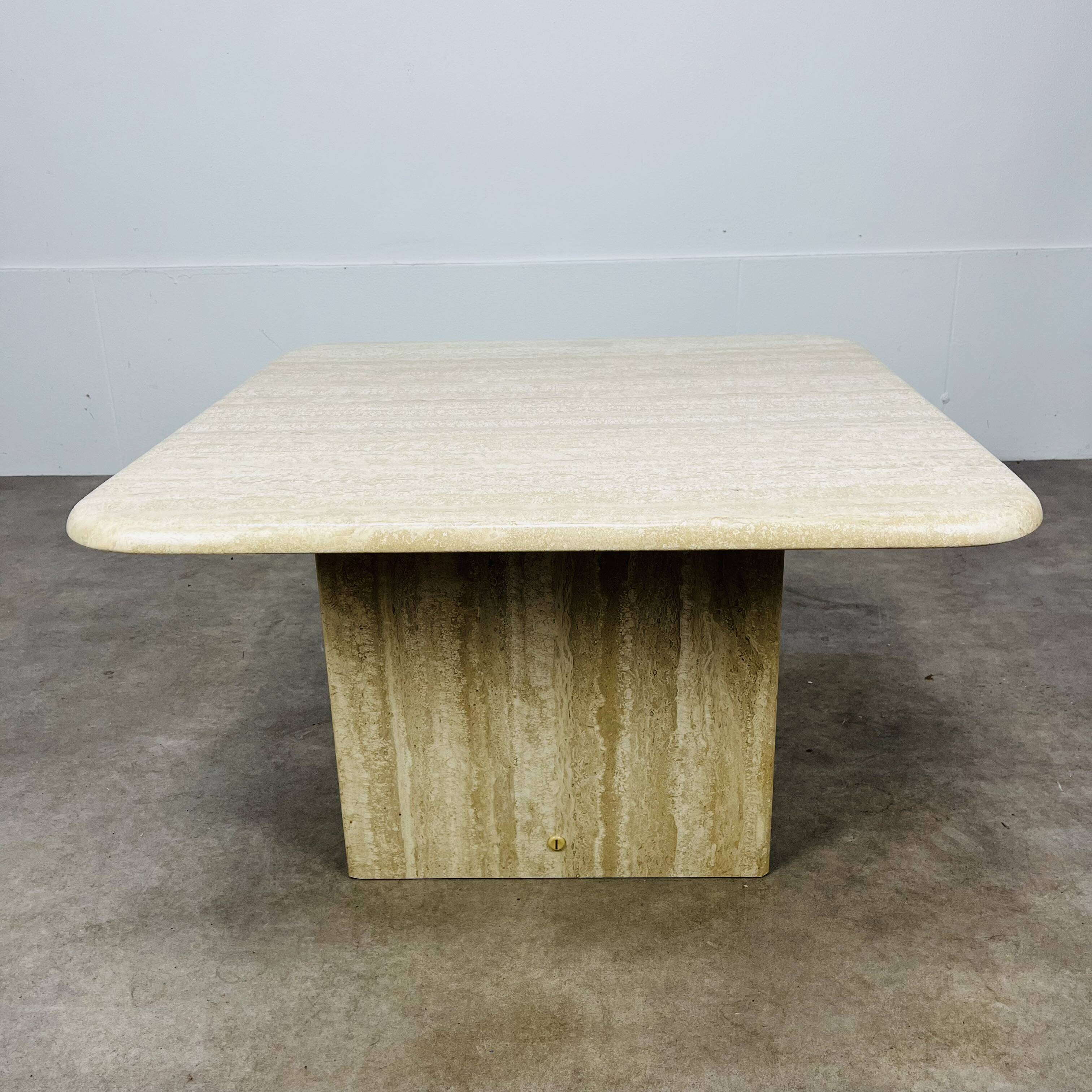 Square travertine coffee table