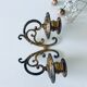 Old wall candle holder in golden brass