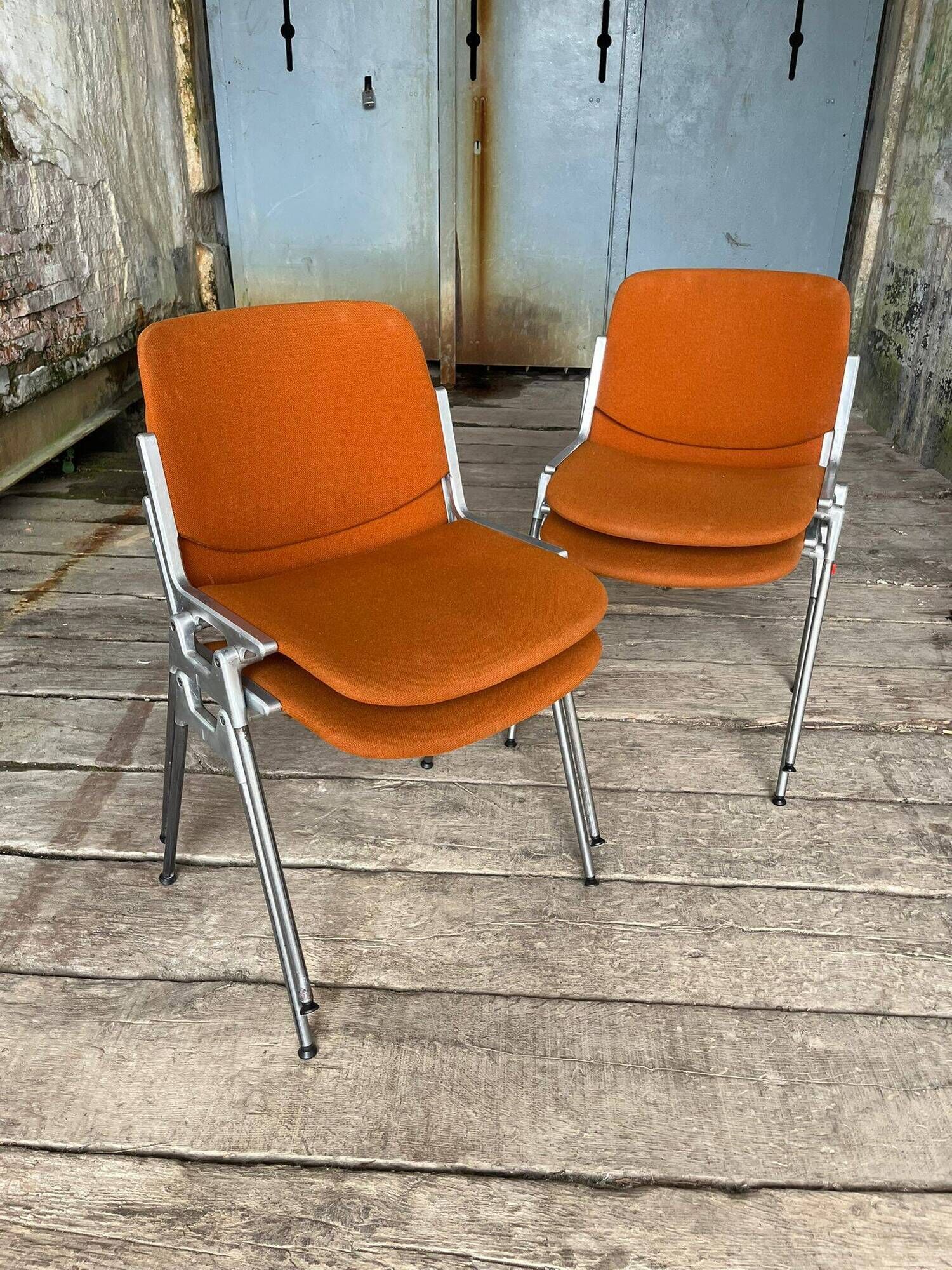 DSC 106 chair in orange by Giancarlo Piretti for Castelli, 1970s.