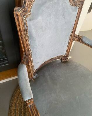 Pair of cabriolet armchairs in light grey and dark grey Louis XV style.