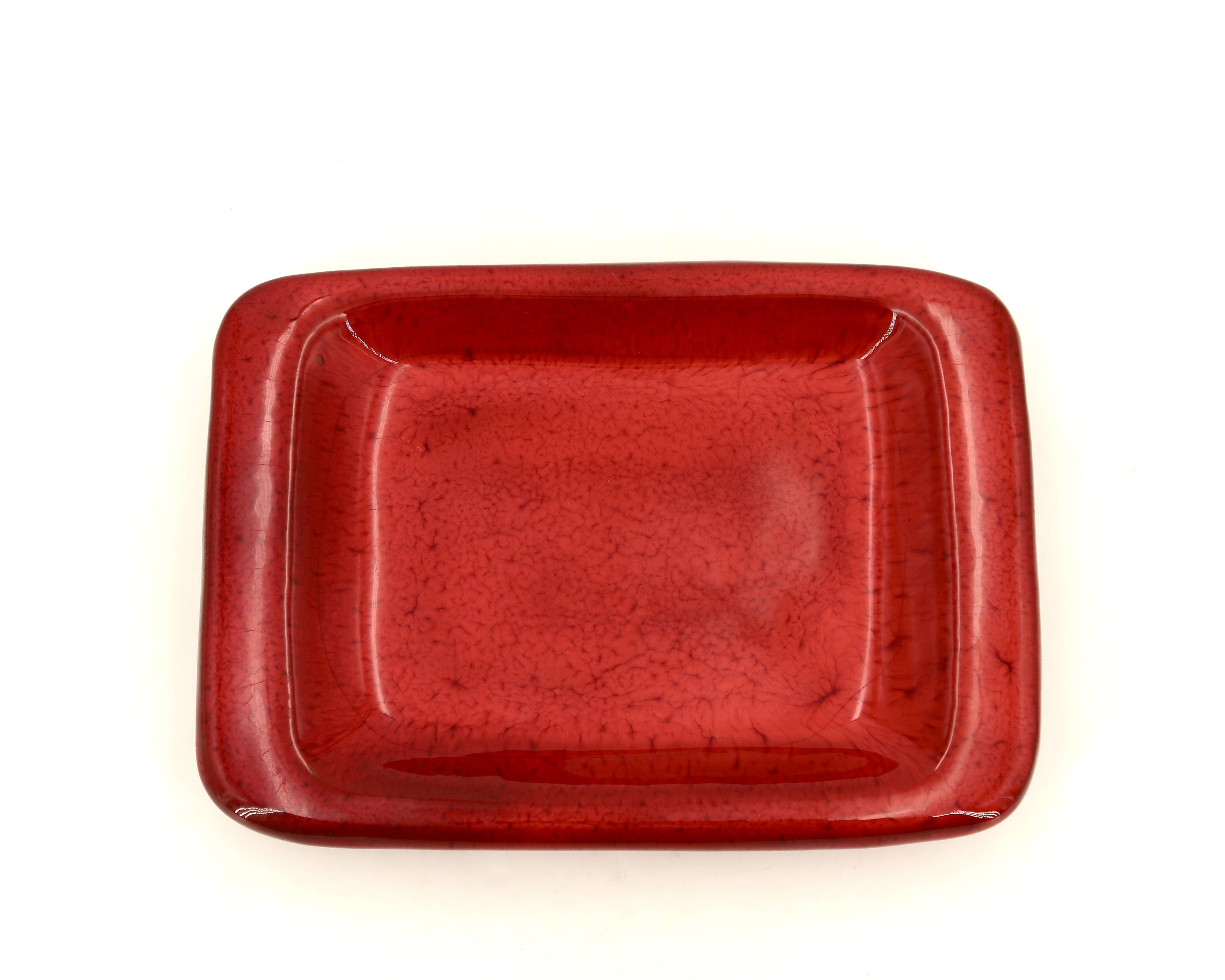 Rectangular ceramic catchall in red by Jean and Robert Cloutier.