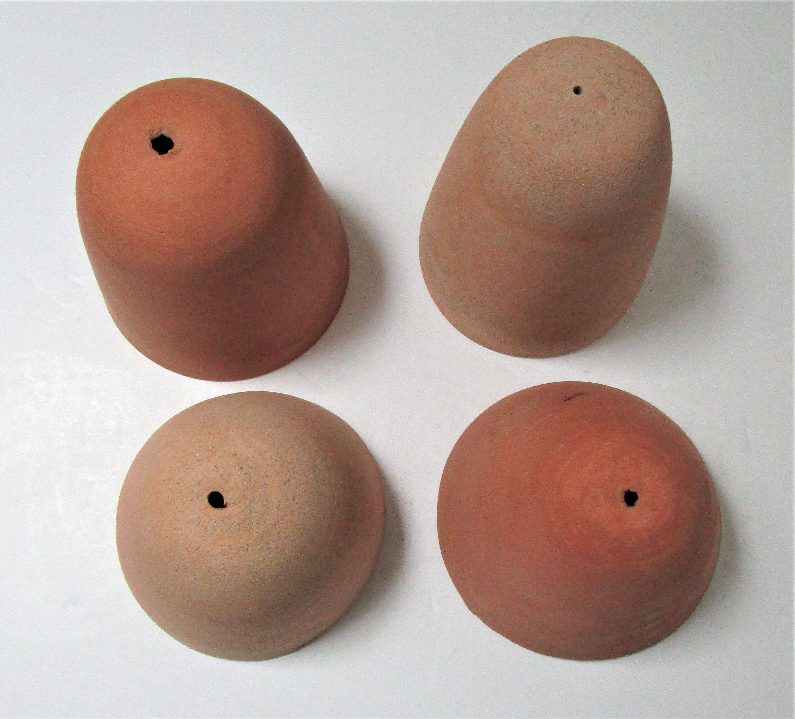 Four bells for seedlings in vintage terracotta