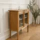 Art Deco sideboard in raw wood with a wax finish, closed by 2 glass doors.