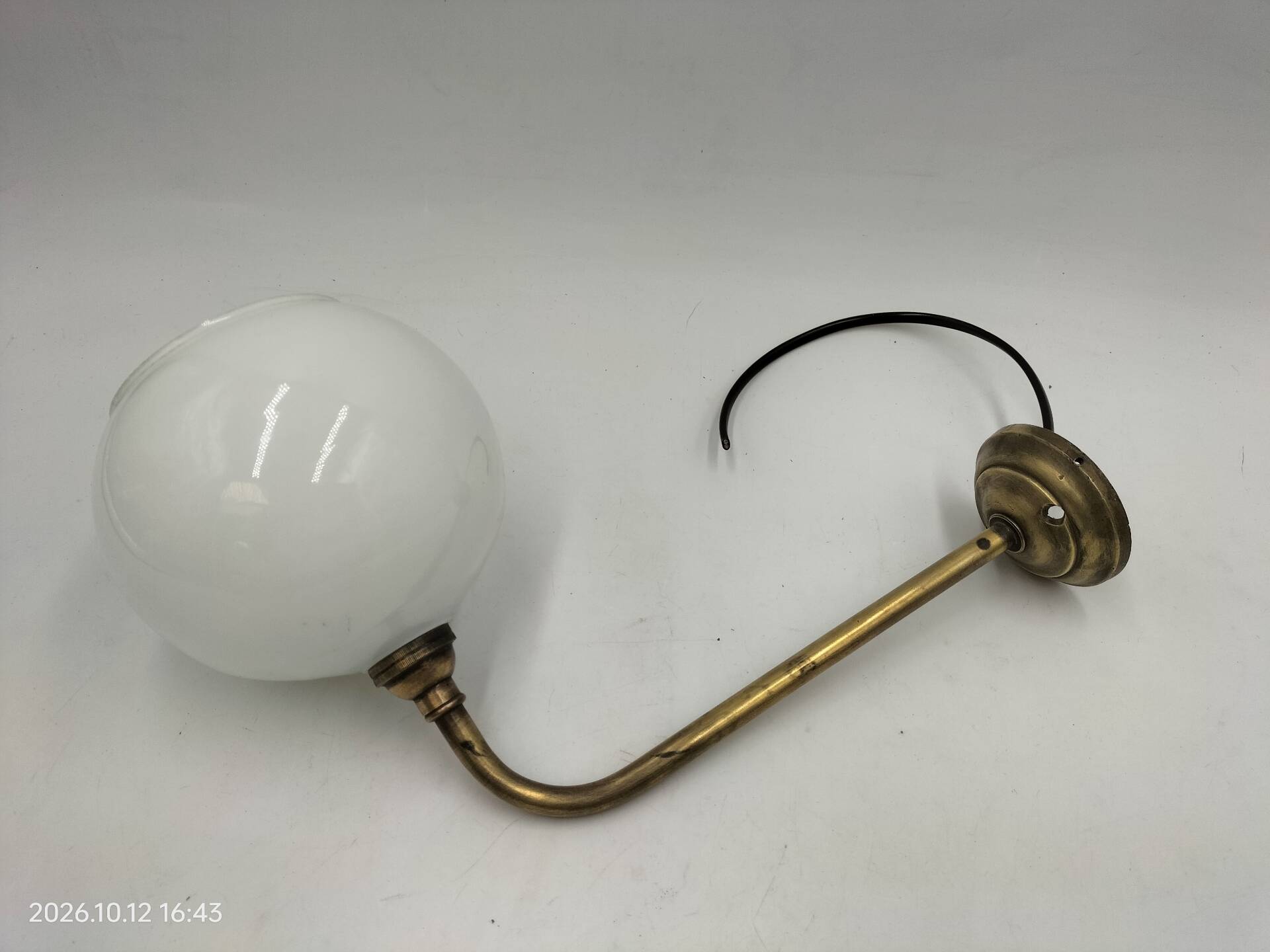 Brass and glass wall light