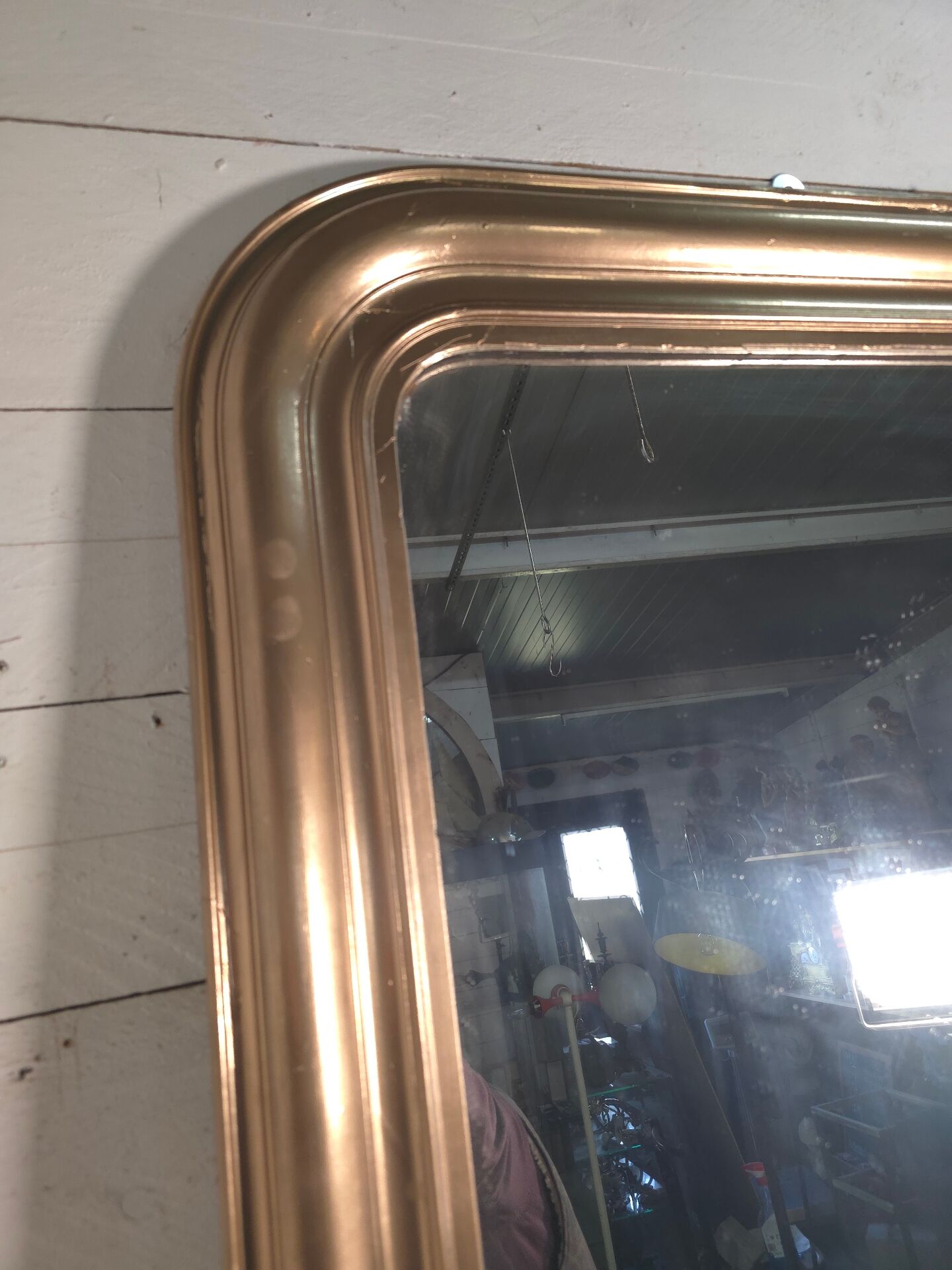 Golden mirror in Louis Philippe style
