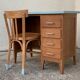 Vintage desk compass feet 1950 and its Baumann chair