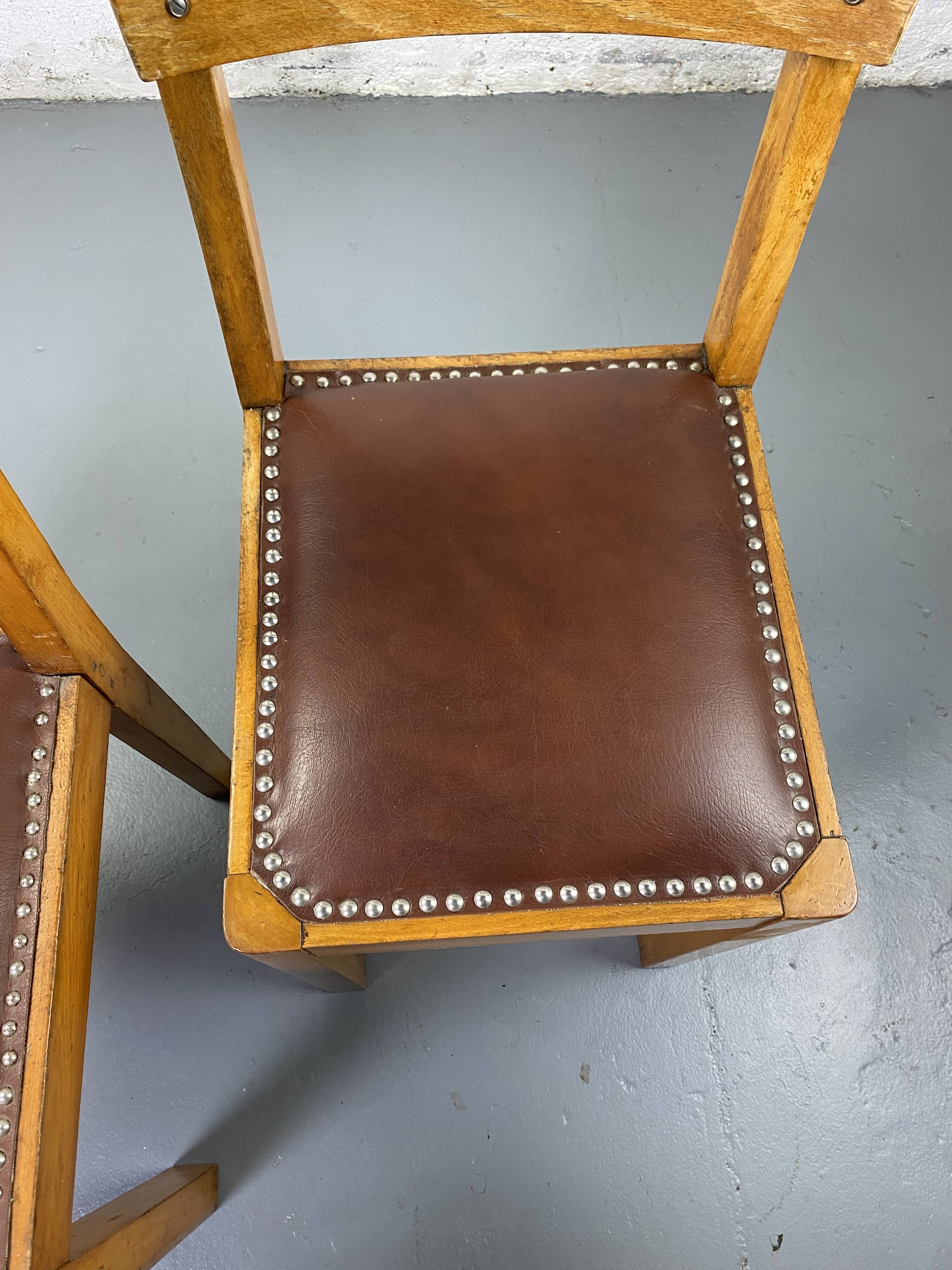 Wooden and leather chairs