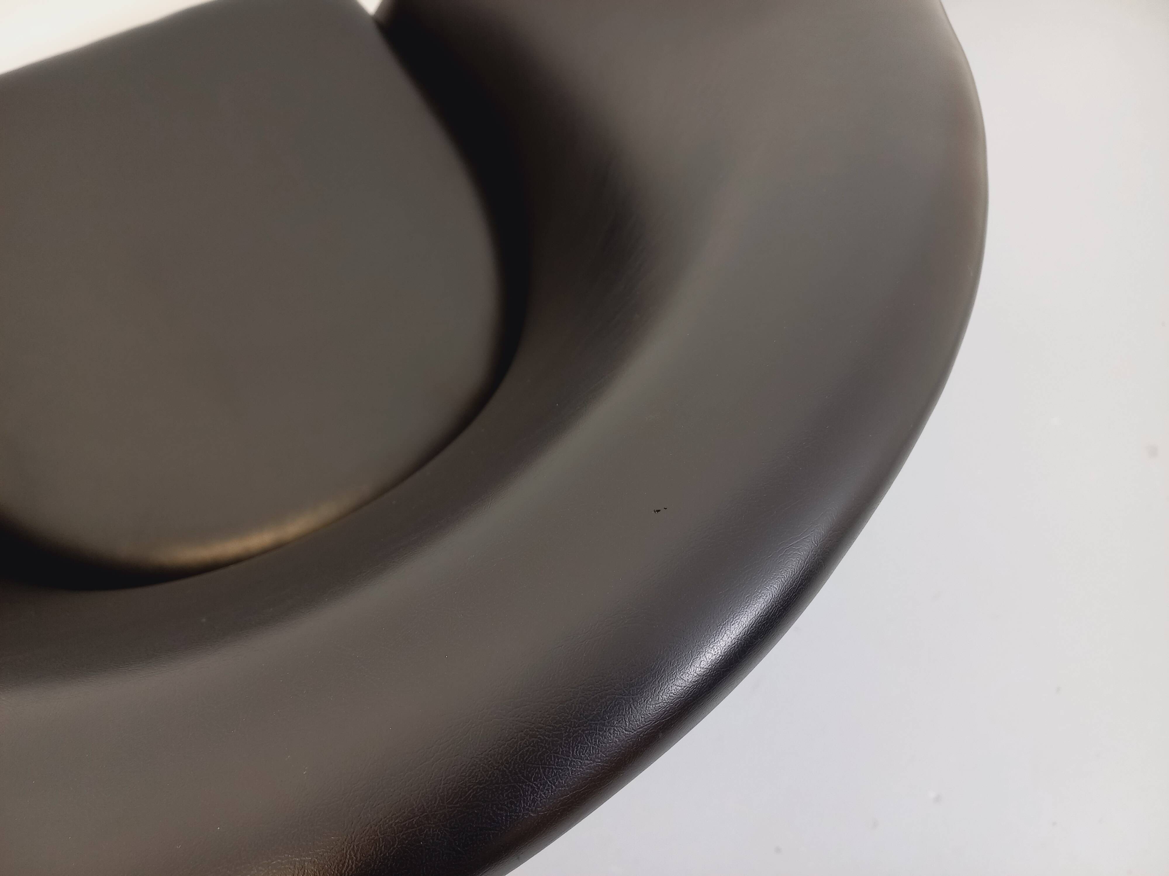 Vintage Scandinavian swivel chair in faux leather and chrome from the 1970s.