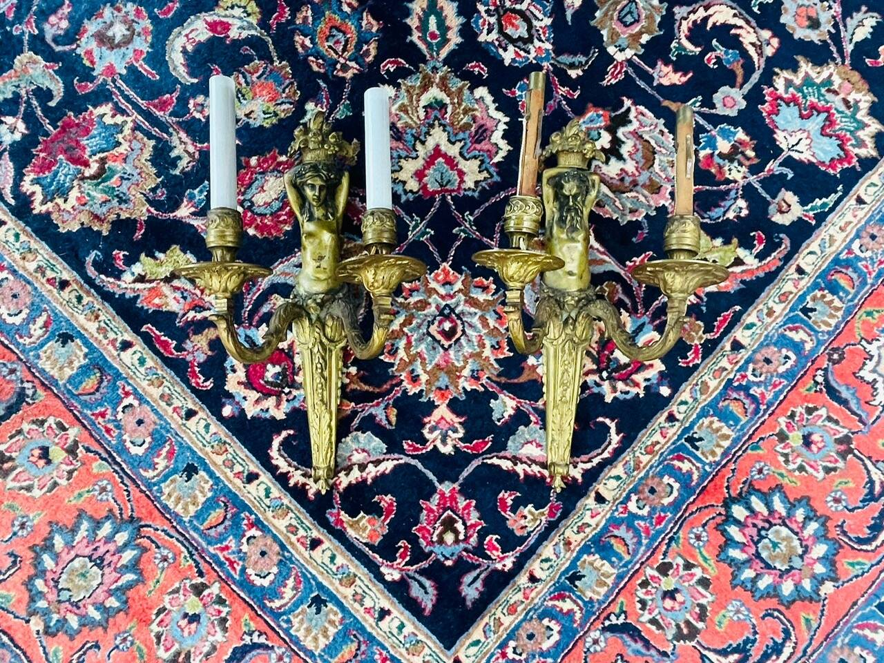 Pair of gilt bronze wall sconces with caryatid and Atlante decoration, 18th century.