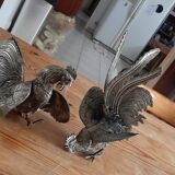2 silver metal roosters