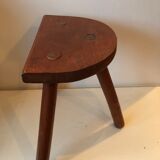 Old wooden tripod stool