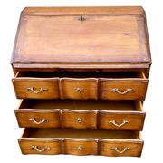 Secretary desk called "scriban" in Louis XV style made of fruitwood.